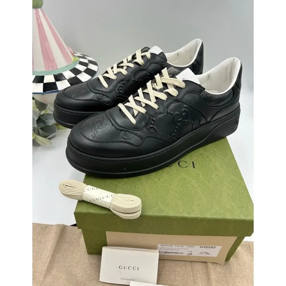 Men's Gucci, GG embossed leather sneakers size 13 fits 13.5 US made in Italy